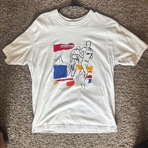 New Balance White Graphic Tee with Multicolor Design